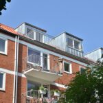 Dachgeschossausbau und Sanierung Mehrfamilienhaus